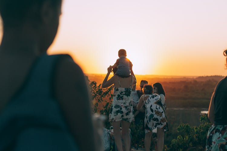 Family Looking At Sunset