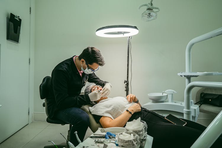 Dentist Treating Patient