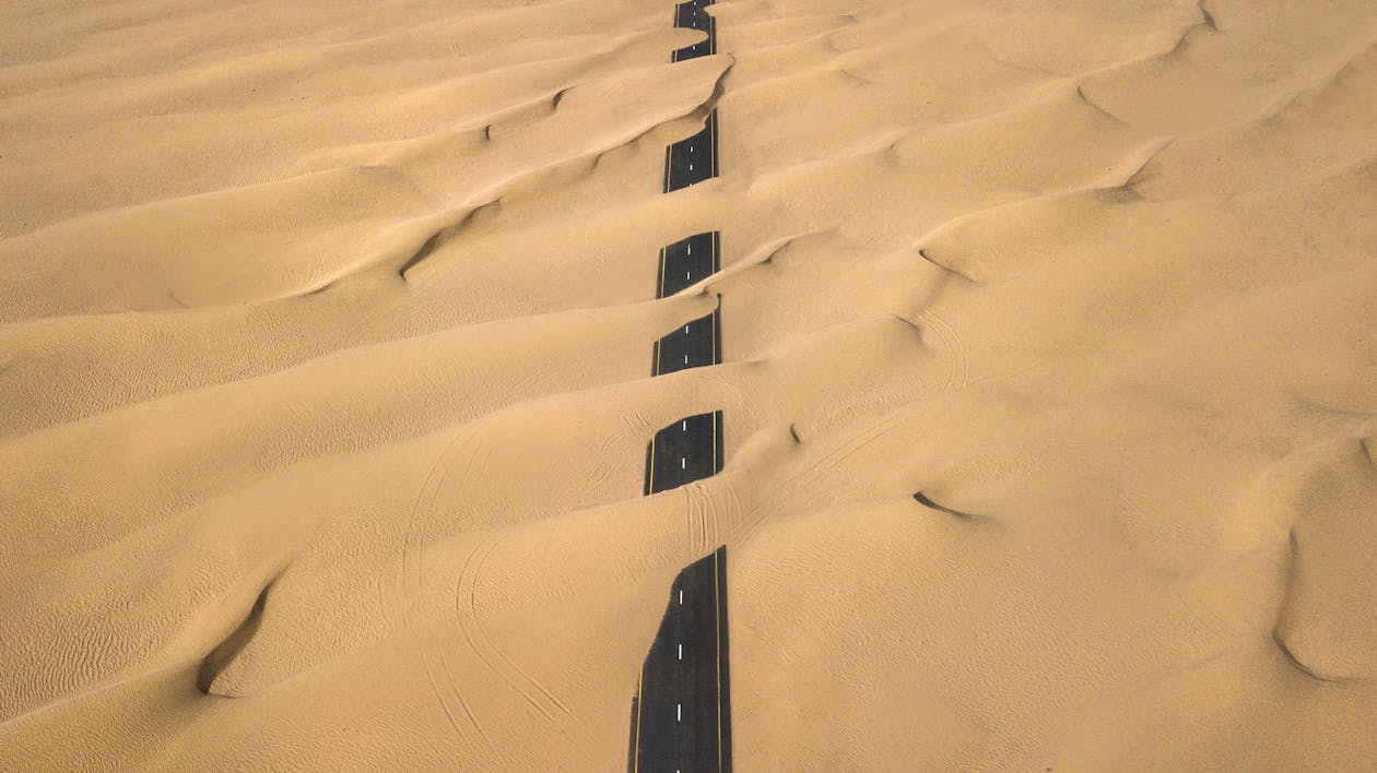 Road Covered With Sand 