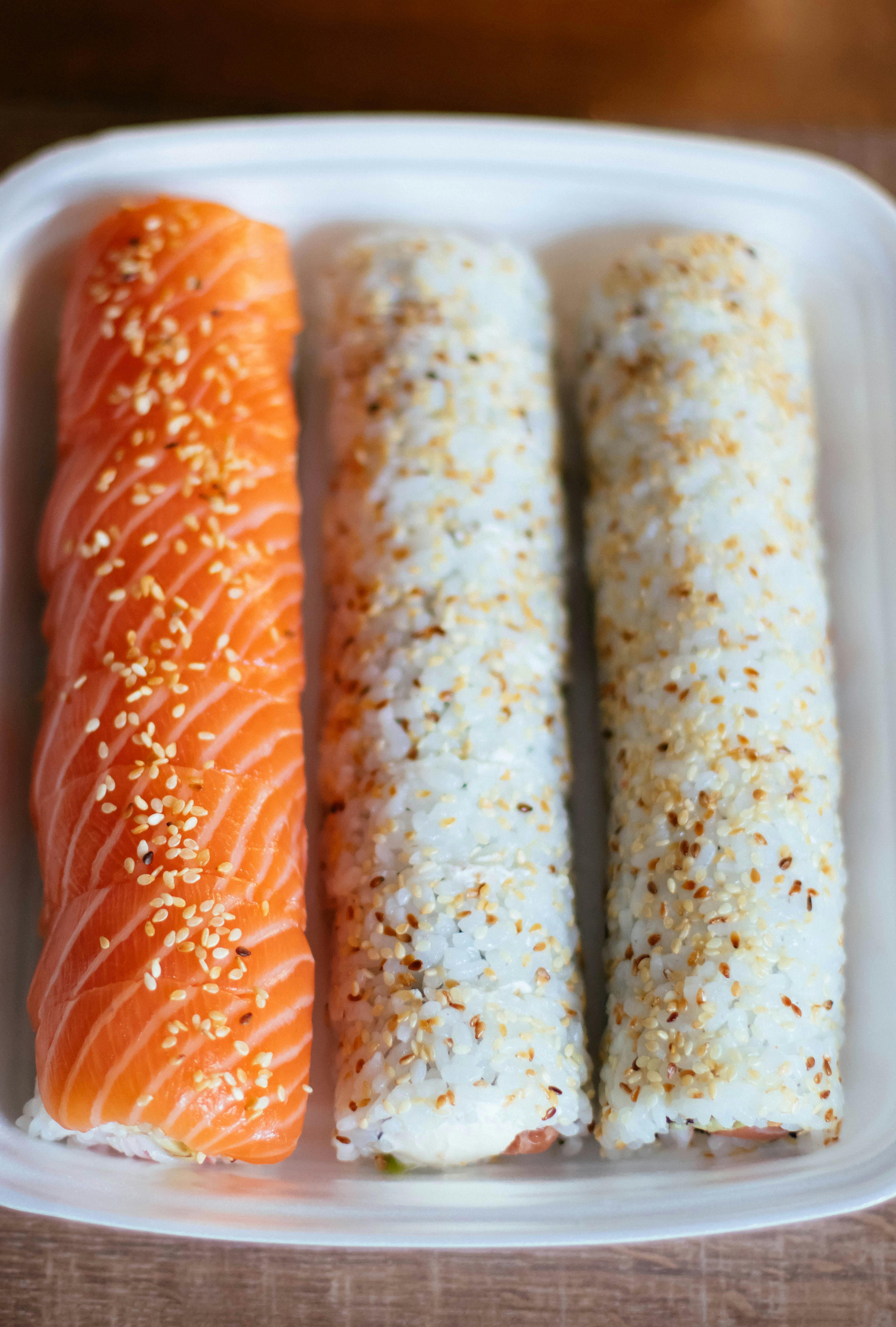 Three Sushi Rolls in White Plastic Container · Free Stock Photo