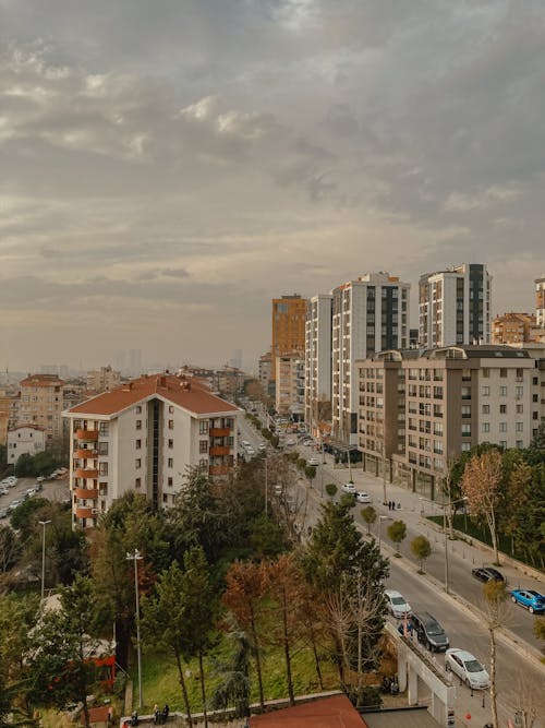 Aerial View of City Buildings Under Gray Sky