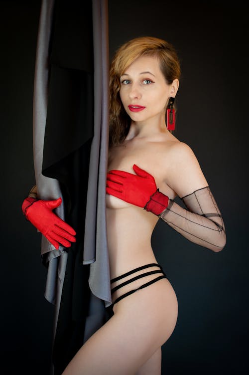 Woman Wearing Red Gloves
