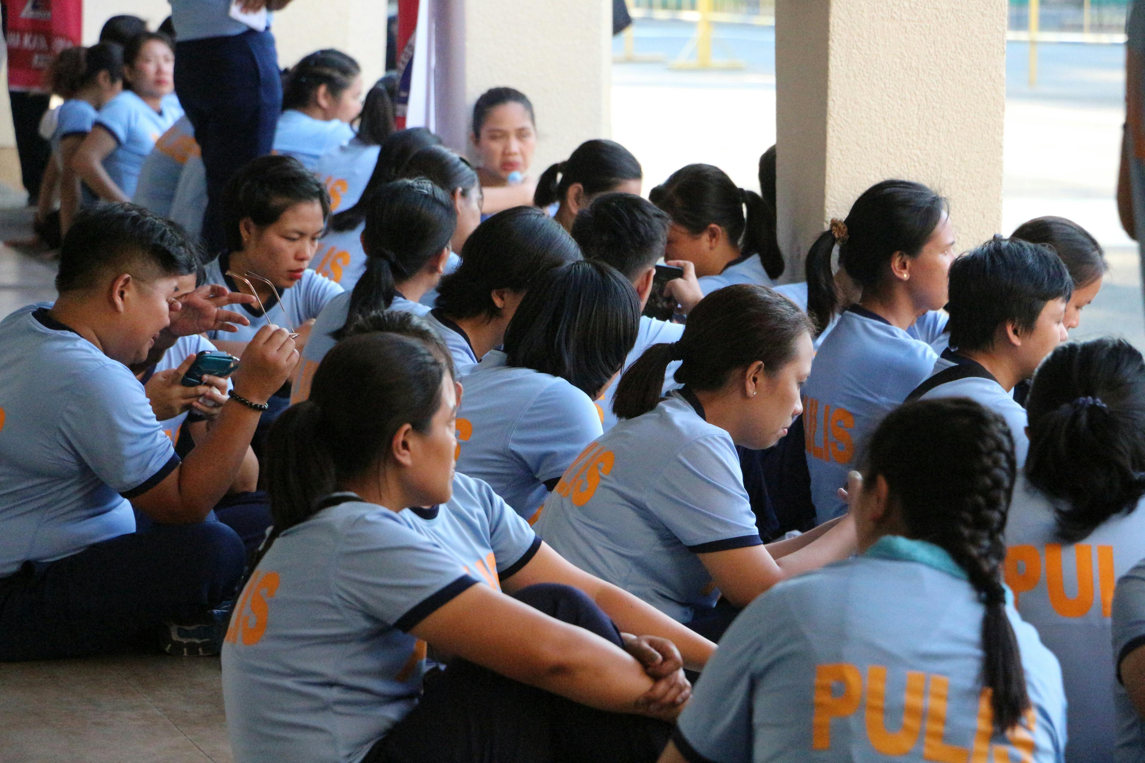 People Sitting on Chair Inside Room