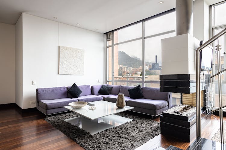 Couch And Big Windows In Living Room