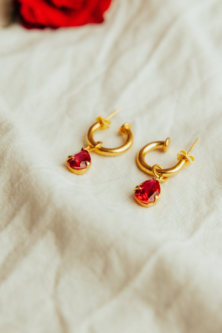 Golden Earrings With Red Gemstone