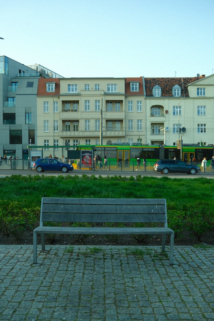 Empty Bench On City Street