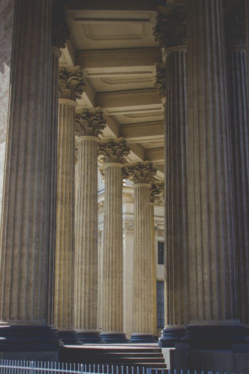 Free Vertical view of grand ornate columns showcasing classic architecture. Stock Photo