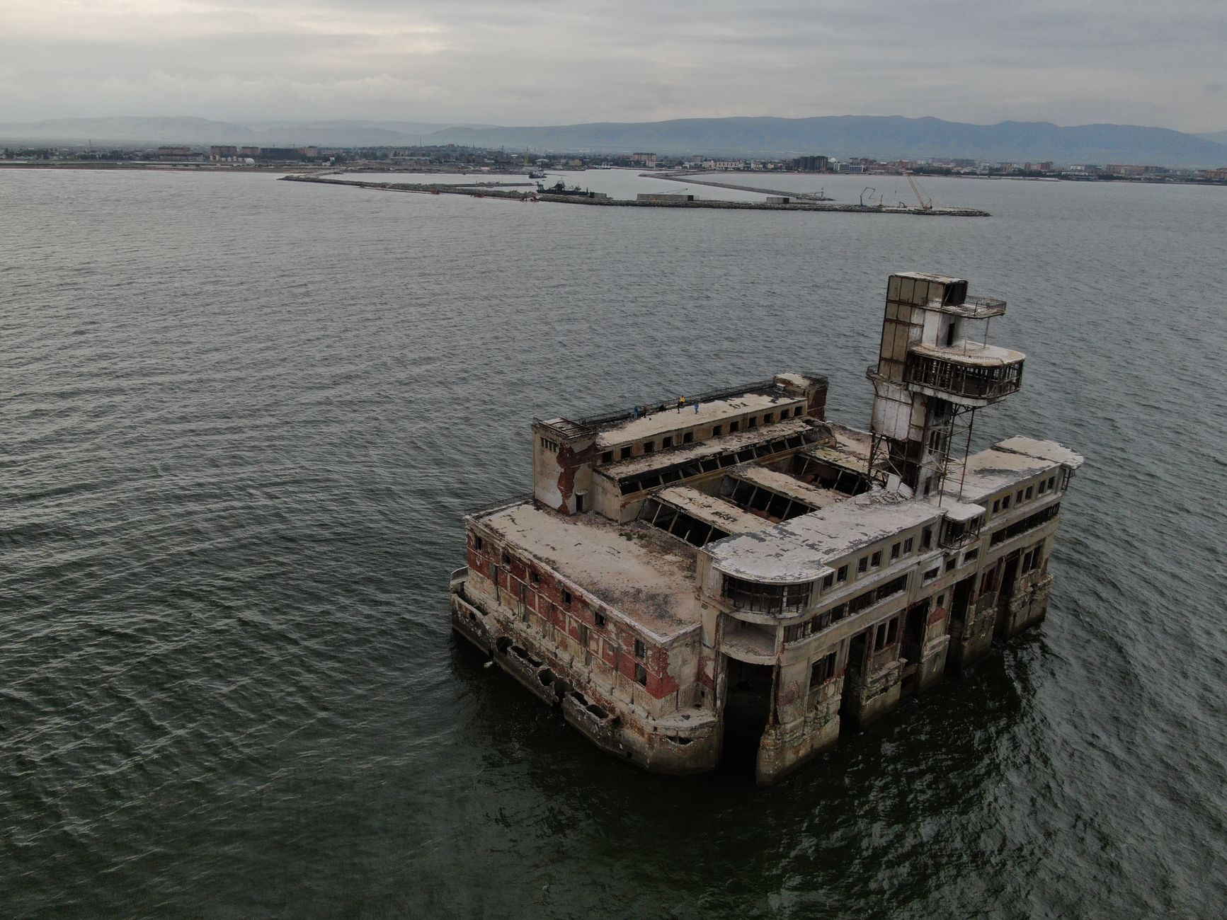 Aerial photo of an abandoned industrial structure in the sea near Kaspiysk, Dagestan, Russia.