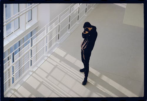 Photographer in Black Sweatshirt