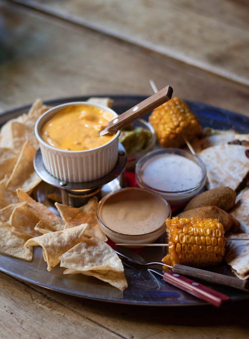Free Corn Cub And Sauces On Plate Stock Photo