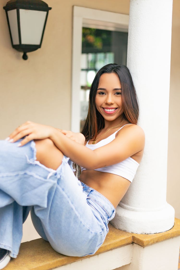 Beautiful Woman Wearing Top And Jeans 