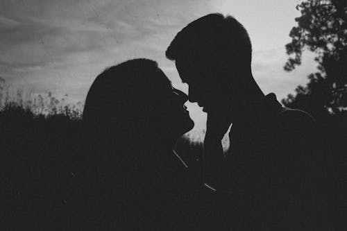 Free Couple Almost Kissing  Stock Photo