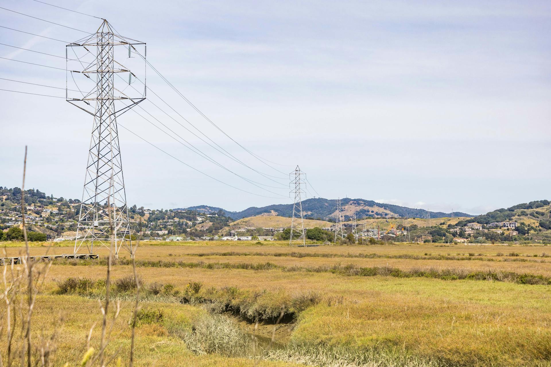 Photo of a Landscape with Electric Line and Transmission Towers