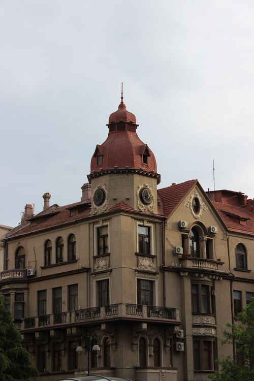 Free Elegant baroque building with tower and red roof in Baku, Azerbaijan. Stock Photo