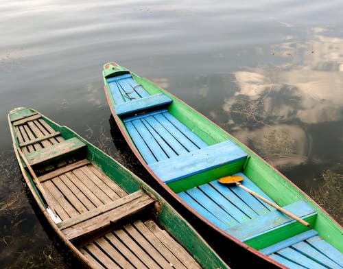 Wooden Boats at Riverbank