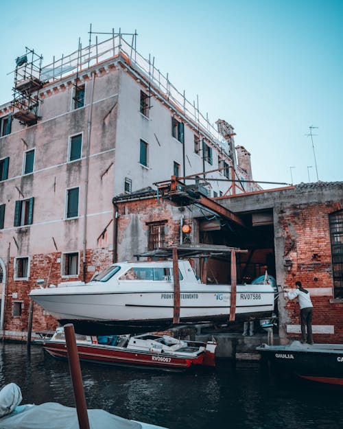 Free A Boat Being Launched at a Boatyard in Venice Stock Photo