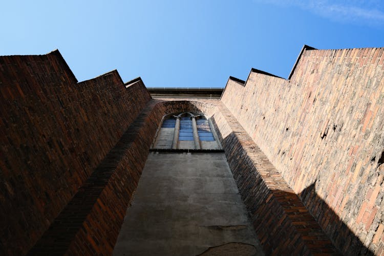 Old Brick Fortress Against Blue Sky