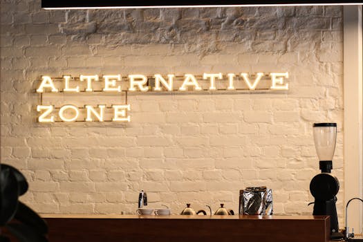 A stylish coffee shop interior in Saint Petersburg featuring neon signage and modern decor.