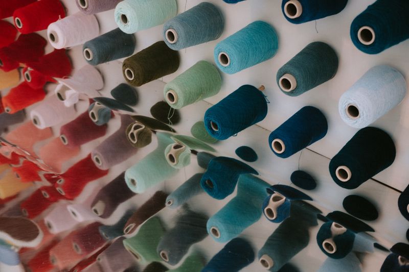 Display of viscose yarn spools in many colours