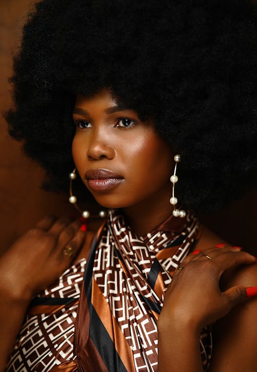 Free Close-up of a Beautiful Woman with Afro Hair Stock Photo