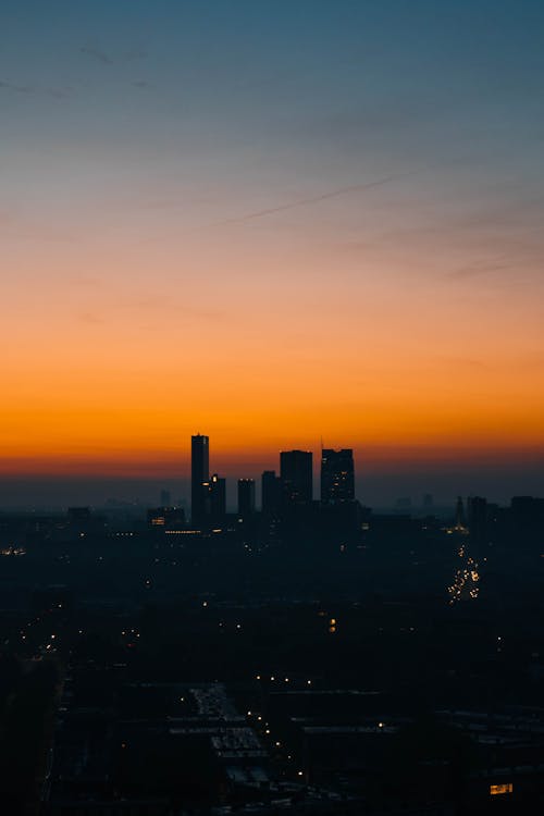 Free City Skyline at Sunset  Stock Photo