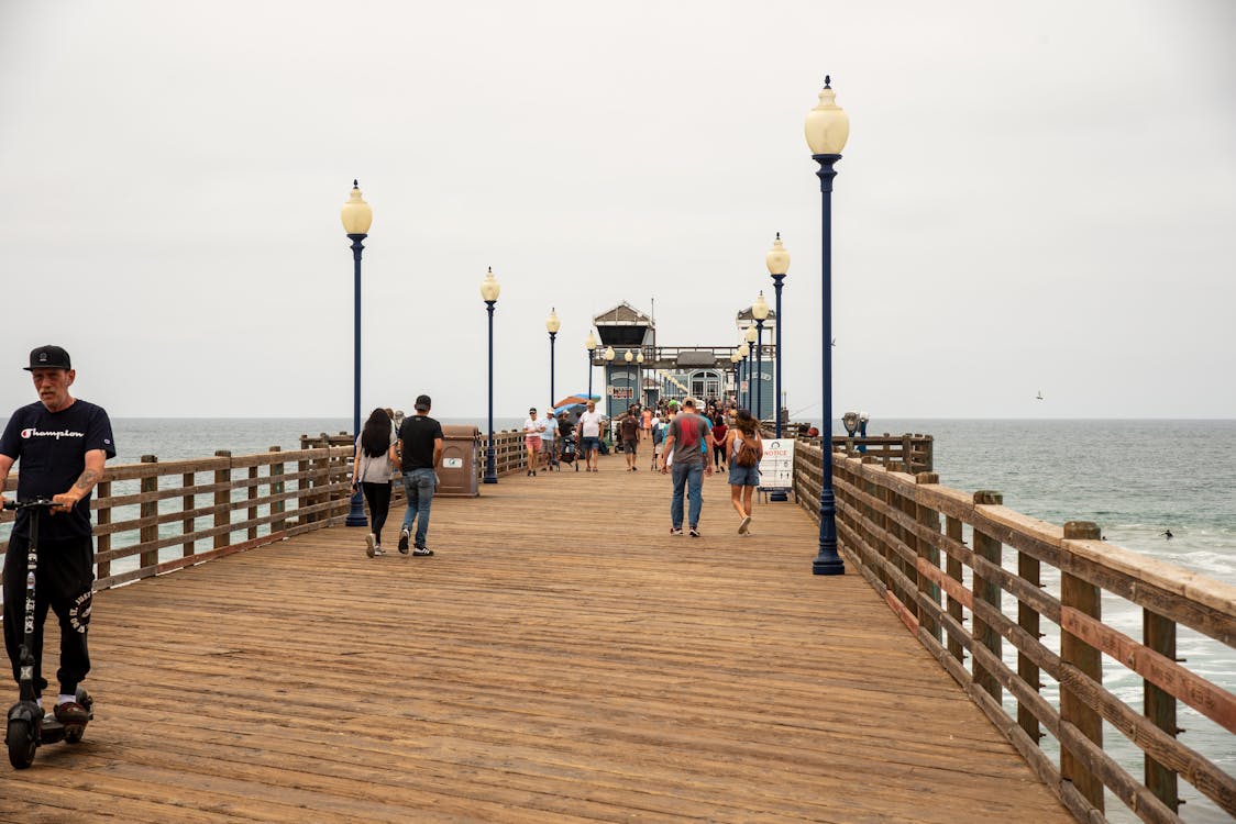 People Walking on a Pier 