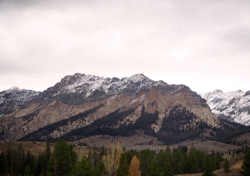 Brown and Gray Rocky Mountain under Gloomy Sky