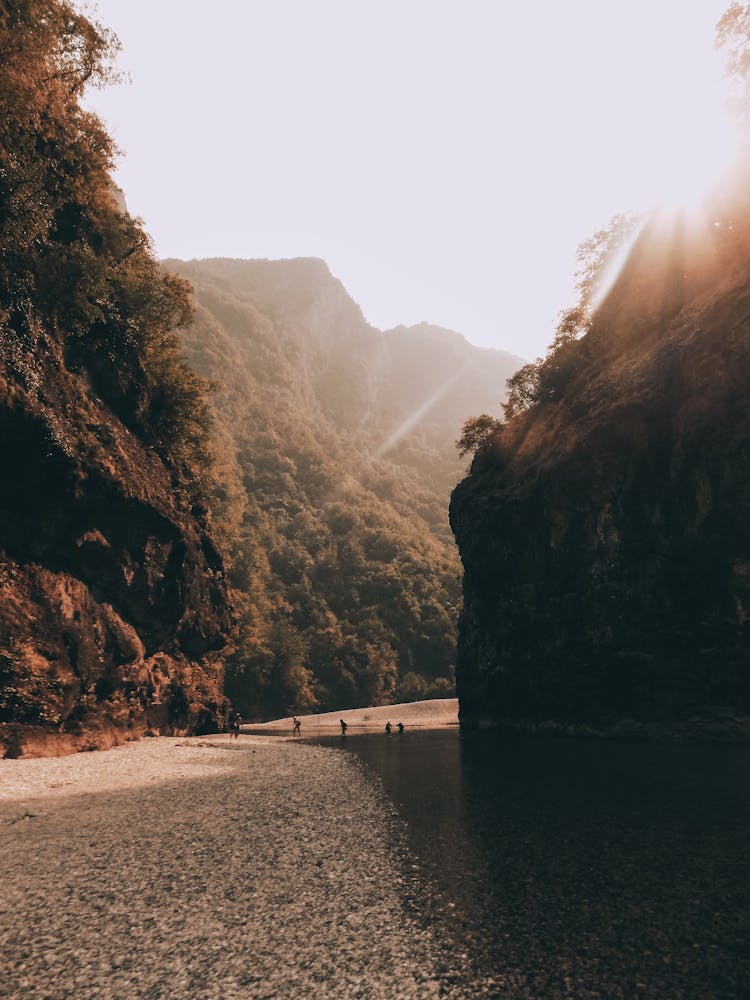 Sunset Sunlight Over Valley With River