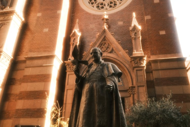 Statue Of Pope John XXIII In Front Of Church