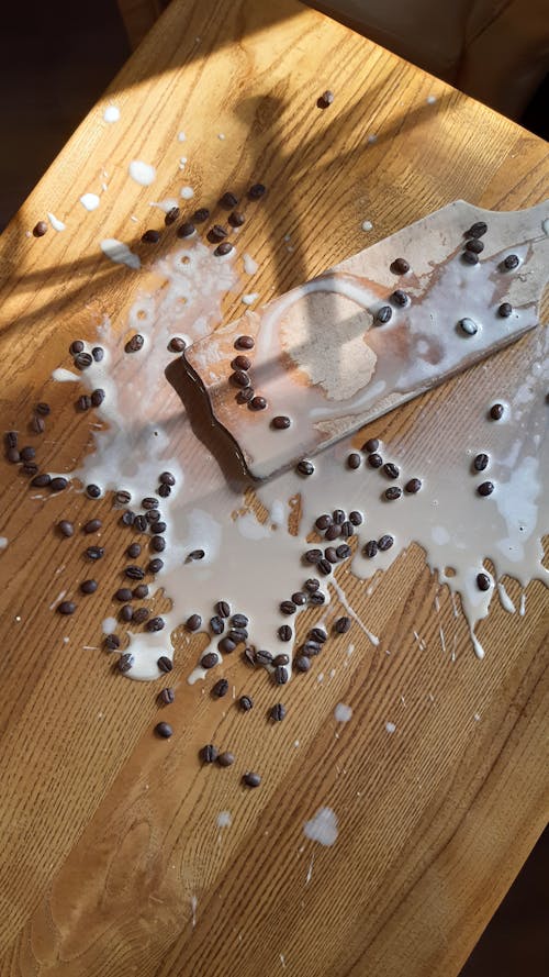 Free Spilled Milk and Coffee Beans Stock Photo