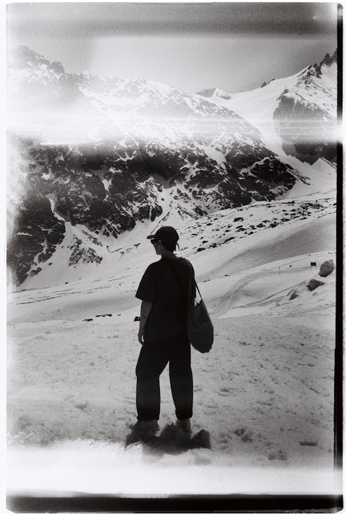 Silhouette of Person Standing on Snow