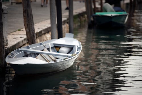 Free White and Blue Boat on Water Stock Photo