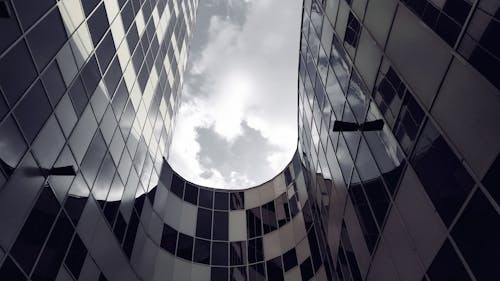 High Rise Building Under White Clouds