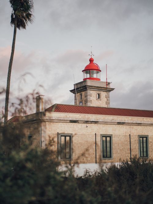 Free Scenic view of Ponta da Piedade Lighthouse, Lagos, Portugal under a cloudy sky. Stock Photo