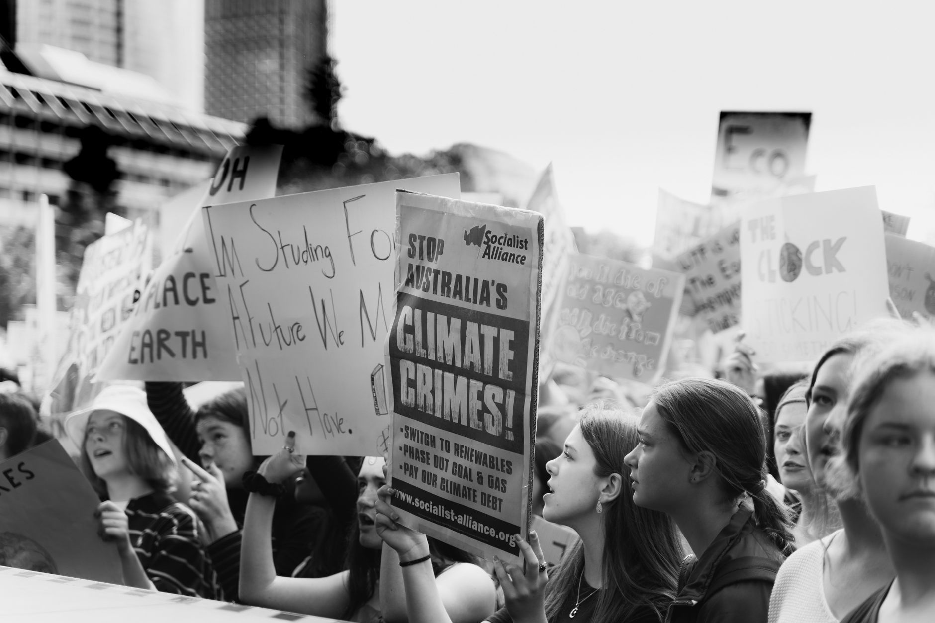 Passionate protestors rally against climate change in Sydney's city center.