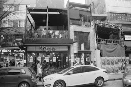 Cars and Shops on City Street