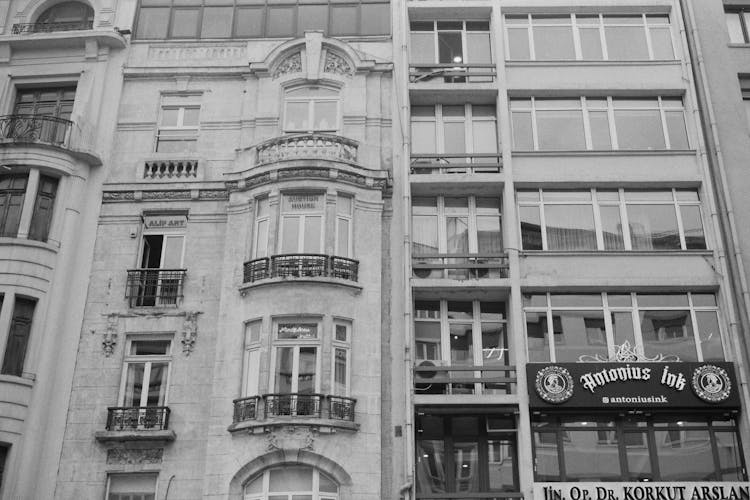 Grayscale Photo Of Concrete Building