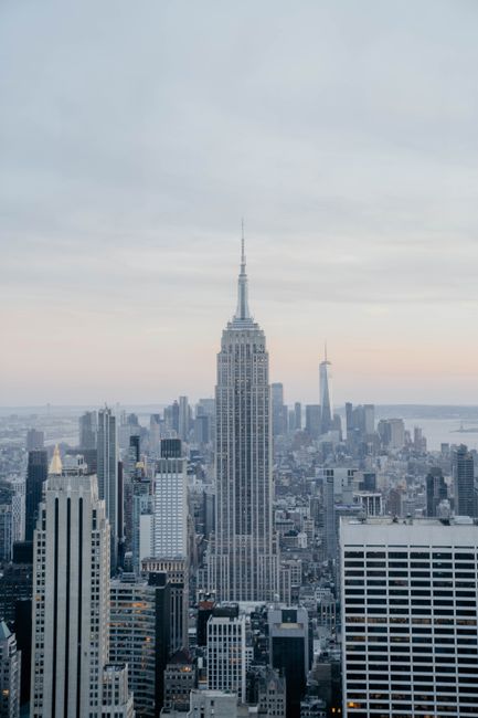 Iconic New York skyline featuring the Empire State Building during daytime.