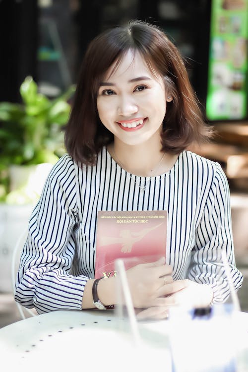 Free Woman Holding Book  Stock Photo