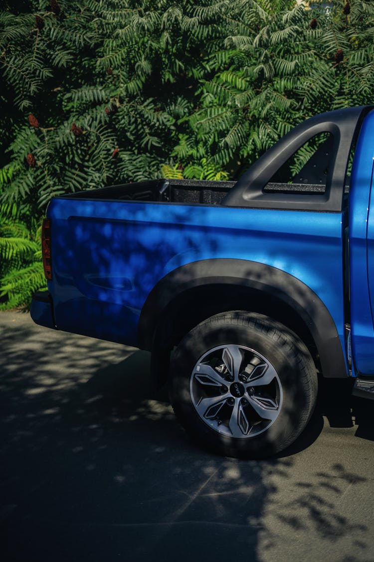 A Blue Crew Cab Pickup Truck