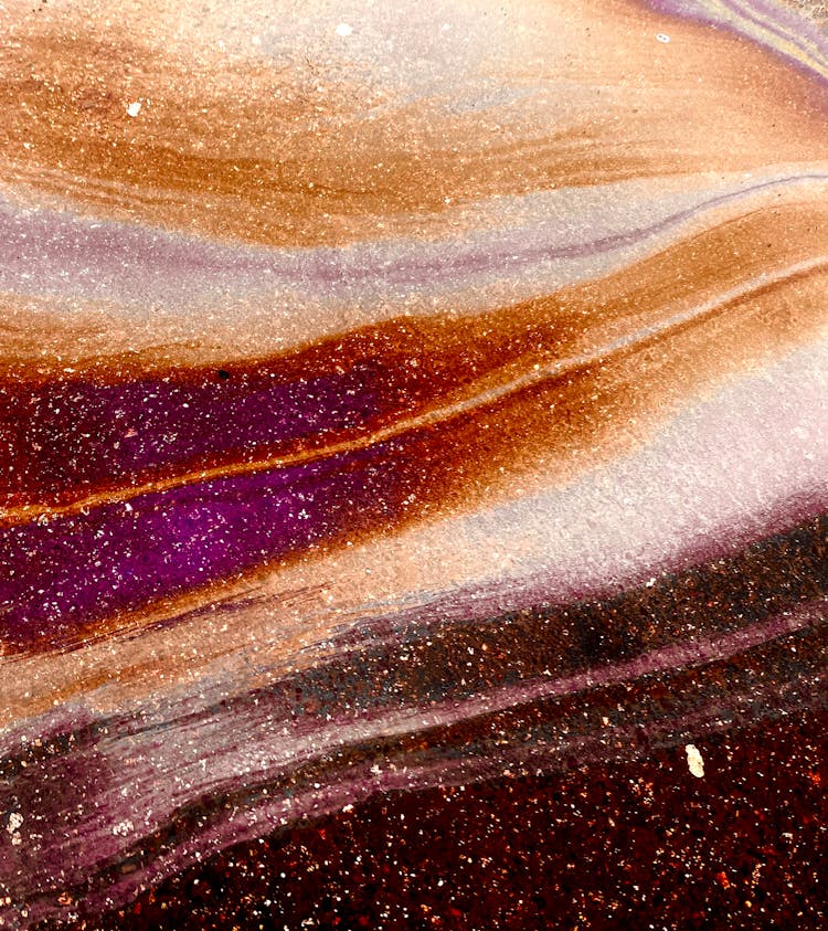 Abstract Photo Of Orange, Pink And Red Shining Trails Of Glitter