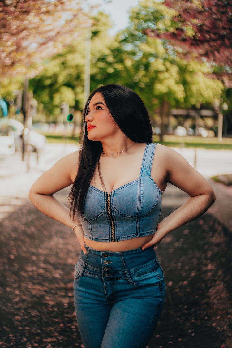 Woman In Blue Denim Crop Top And Jeans