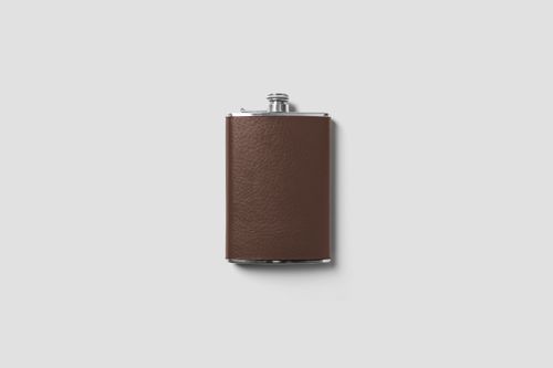 Free Sophisticated brown leather flask isolated against a white background, perfect for product showcases or mockups. Stock Photo