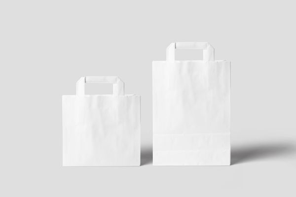 Plain paper packaging bags on a neutral backdrop — photo by Mr. Mockup on Pexels