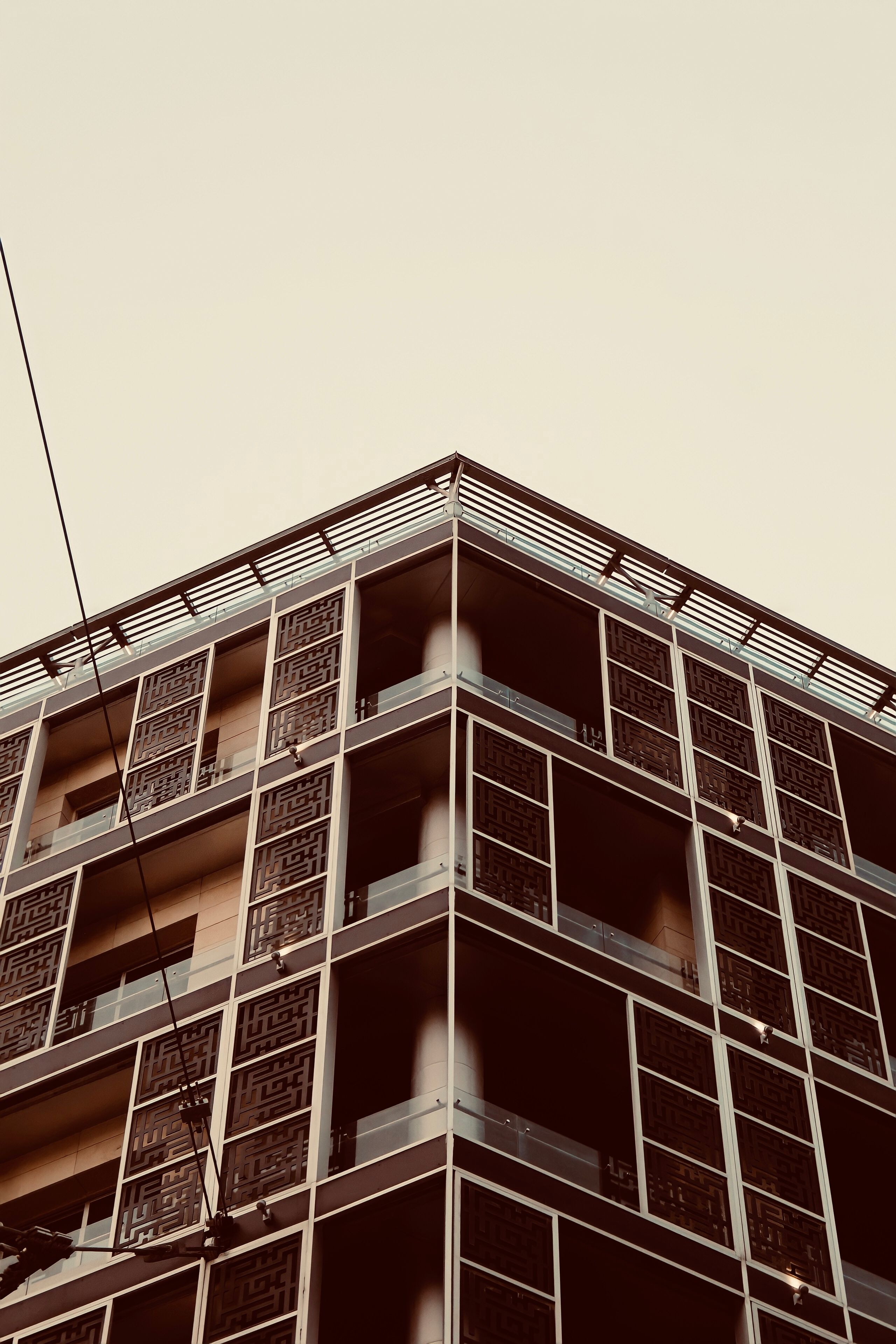 A Concrete Building Under the Blue Sky · Free Stock Photo