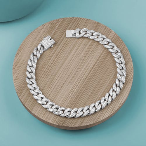 Free A Diamond Necklace on a Wooden Board  Stock Photo