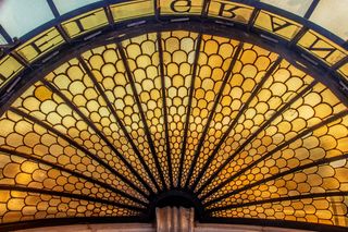 Amber fanlight window glazing — photo by Julio Irrazabal on Pexels