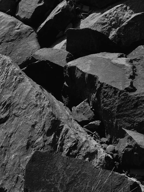 Grayscale Photo of Rock Formations