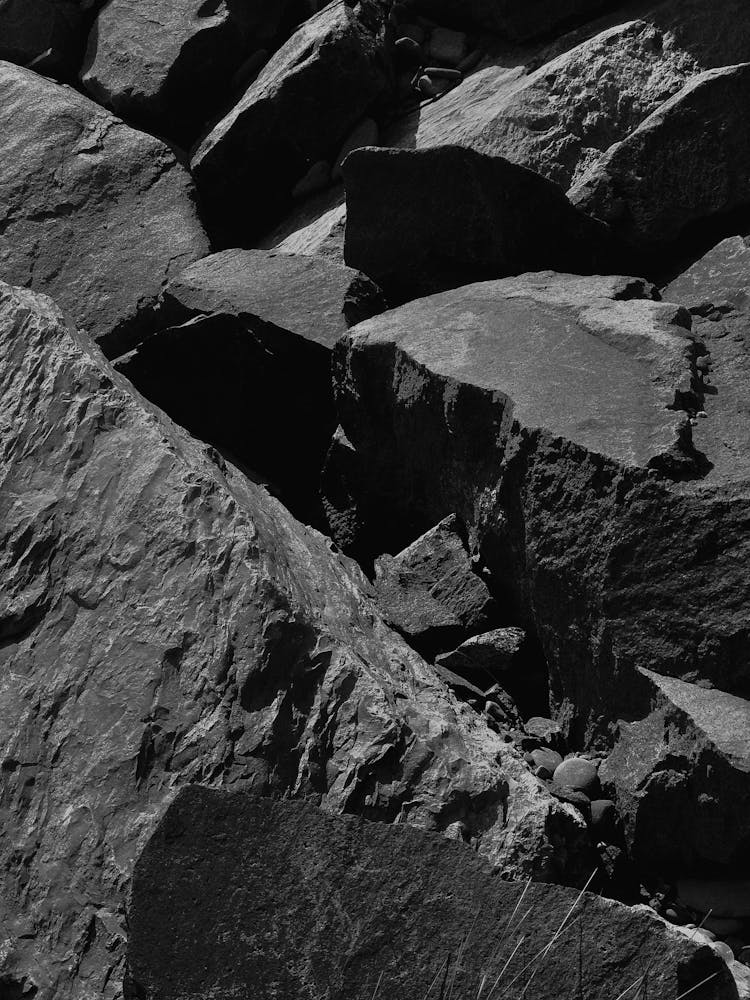 Grayscale Photo Of Rock Formations