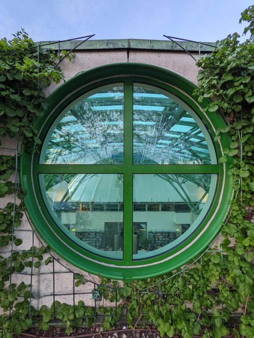 Close-Up Shot of a Round Wooden Window · Free Stock Photo